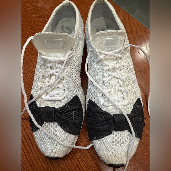 Nike Other - Nike Flyknit Racer Sneakers with Black Bow Detail